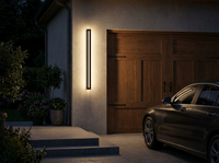 AquaBeam Black Outdoor Wall Light IP65 — in-use