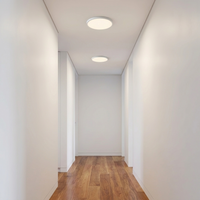 Luminara | Sleek Ultra-Thin Round LED Ceiling Light Fixture — White trim, in a hallway